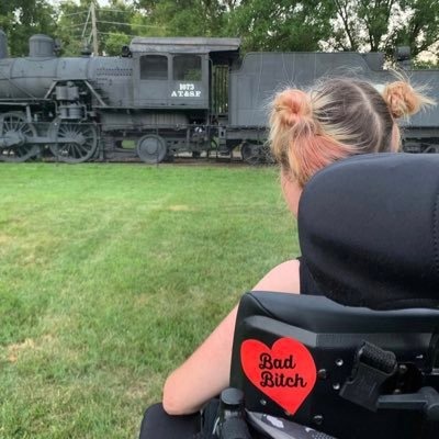 Hannah Soyer looking at a train